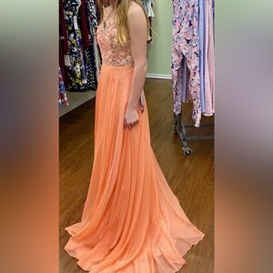 Norma’s boutique coral prom dress